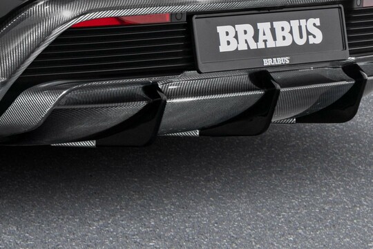 Carbon rear skirt insert